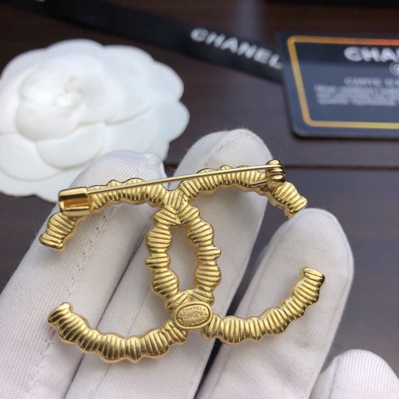 Ch**el brooches